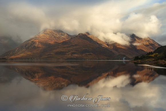 Five Sisters and Loch Duich. Cloudy reflection. Scotland.