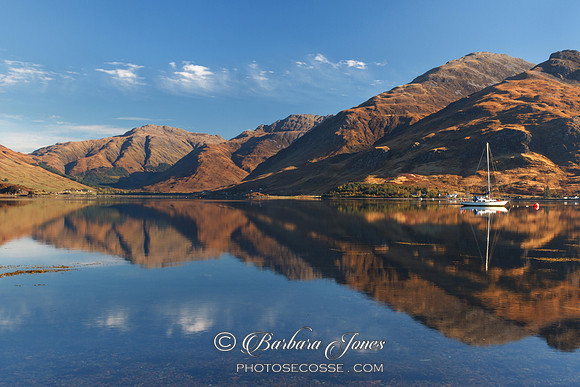 Loch Duich, Kintail Reflections and Boat. Scotland.