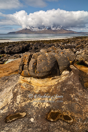 Sandstone Concretions and Isle of Rum from Eigg. Small Isles. Scotland.
