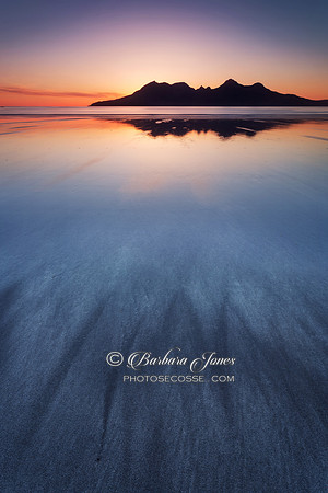 Laig Bay cloudless Sunset and sand patterns. Isle of Eigg. Scotland.