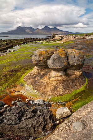 Sandstone Concretions. Isle of Eigg. Cloud over Rum. Small Isles. Scotland.
