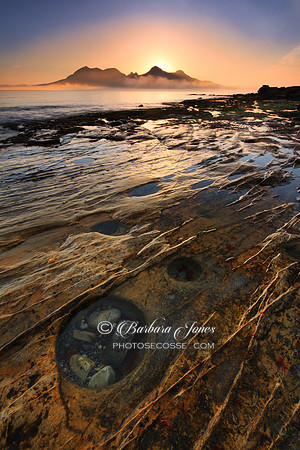 Laig Bay. Misty Sunset over Isle of Rùm. Scottish Highlands and Islands.