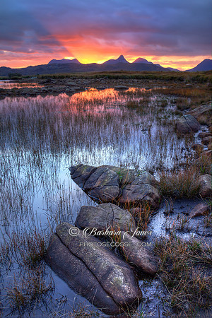 Dubh Lochan. Coigach Sunrise. Peaks of Inverpolly. Scotland.