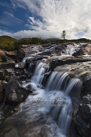 Sligachan River and tree silhouette. Sligachan. Isle of Skye. Scotland.