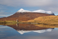 Ardvreck Castle and Quinag. Reflection in Loch Assynt.  Scotland.