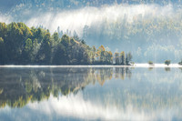 Loch Garry Autumn Mists and Sunbeams Scotland.