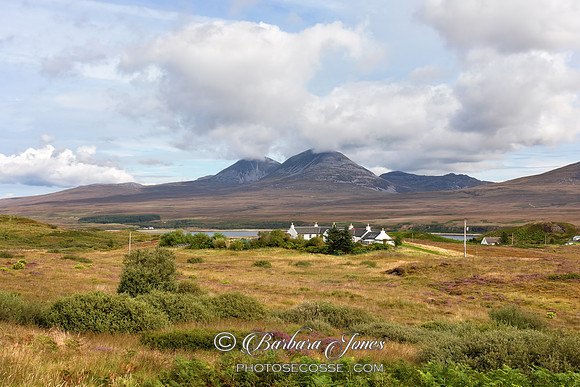 Paps of Jura and Heatherhouse in Summer  Scotland.
