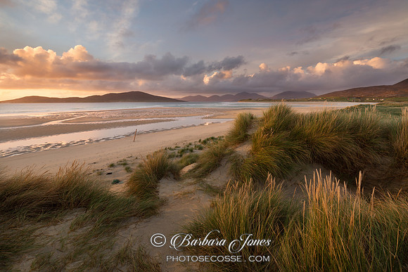 Traigh Seilebost. Sunset over Taransay and North Harris Hills. Eilean Siar. Scotland.
