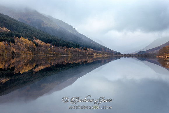 Loch Voil Reflections in Autumn Trossachs Scotland.