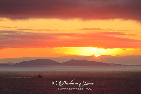 Neist Point Sunset. View over The Uists . Outer Isles. Isle of Skye. Scotland.