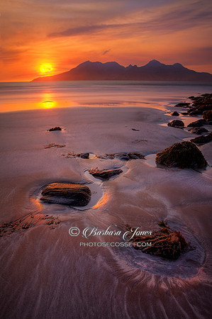 Sunset over Rum,  Isle of Eigg Scotland.