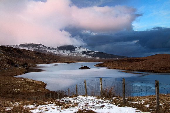 Old Man of Storr and Snow Cloud. Isle of Skye, Scotland.
